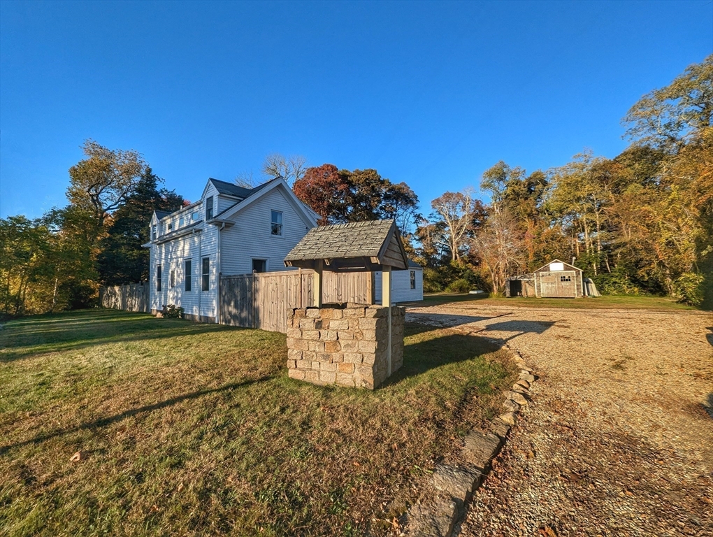 106 Great Neck Road Wareham, MA 02571 - Photo 3 of 30 a front view of a house with a yard
