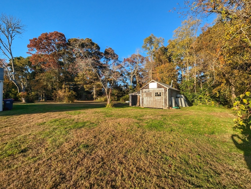 106 Great Neck Road Wareham, MA 02571 - Photo 4 of 30 a view of a house with a yard