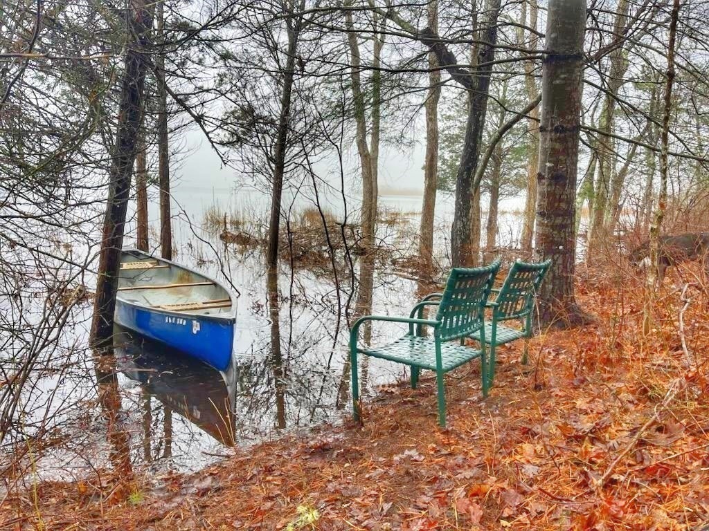106 Great Neck Road Wareham, MA 02571 - Photo 6 of 30 a backyard of a house with table and chairs