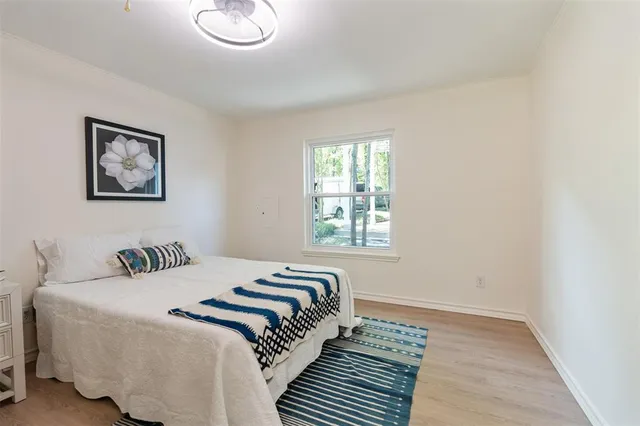 a view of cabinets and wooden floor