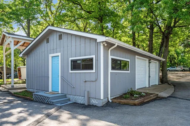 a living room with furniture and a chair