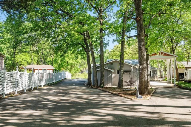 a view of a house with a street