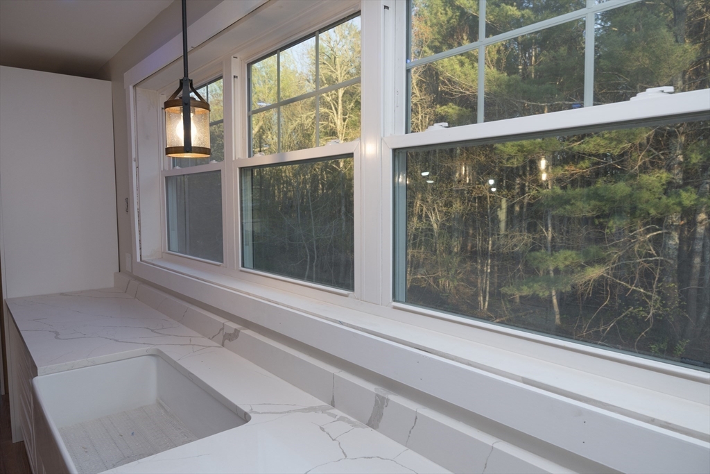 28 Marion Road Rochester, MA 02770 - Photo 12 of 23 a bathroom with a bathtub and shower