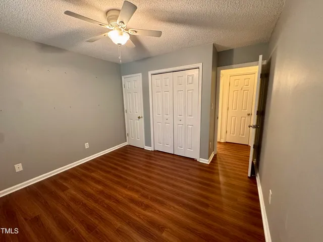 a view of a backyard with a deck