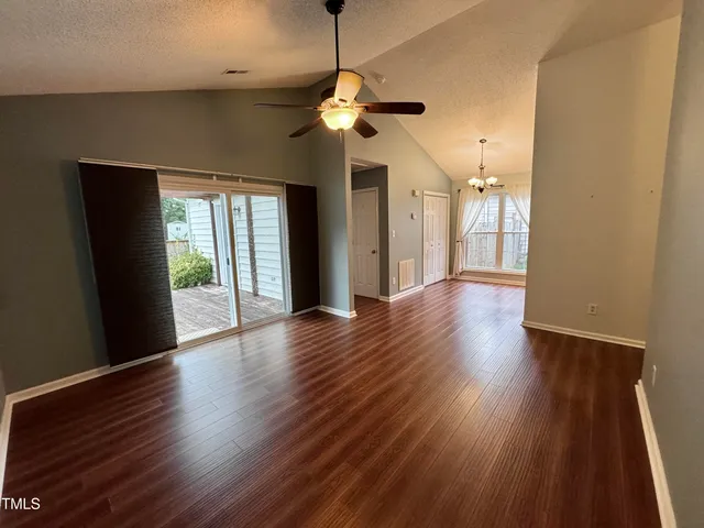 a kitchen with a sink and a stove top oven
