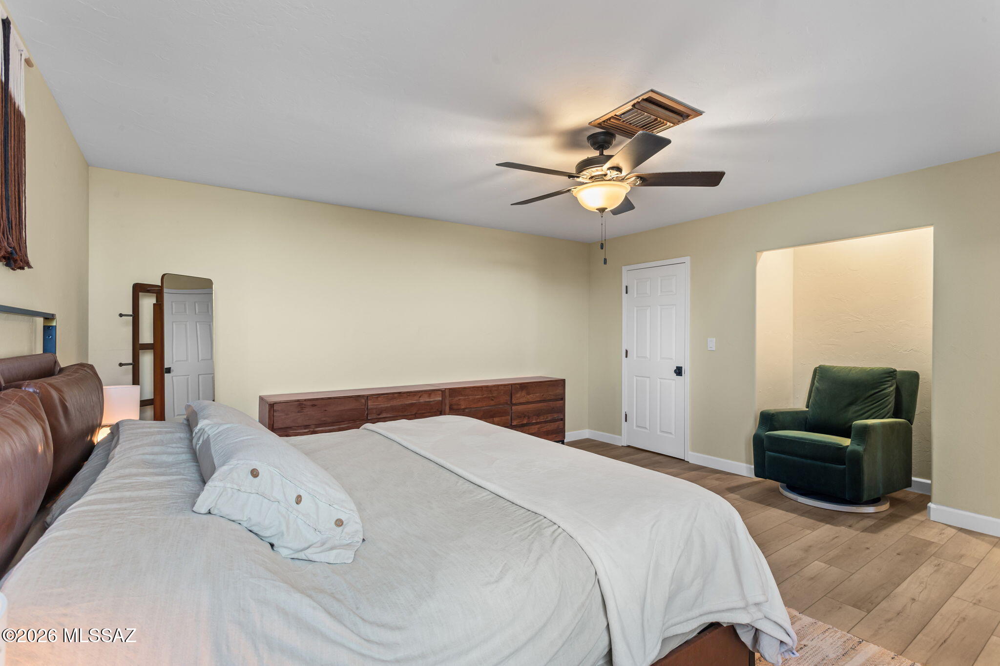4210 West Mossman Road Tucson, AZ 85746 - Photo 29 of 51 a bedroom with a bed and ceiling fan
