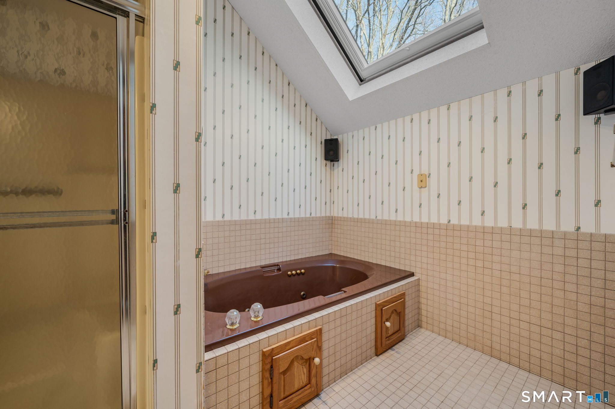 97 West Main Street, Unit 24 East Lyme, CT 06357 - Photo 21 of 39 a bathroom with a bathtub and shower
