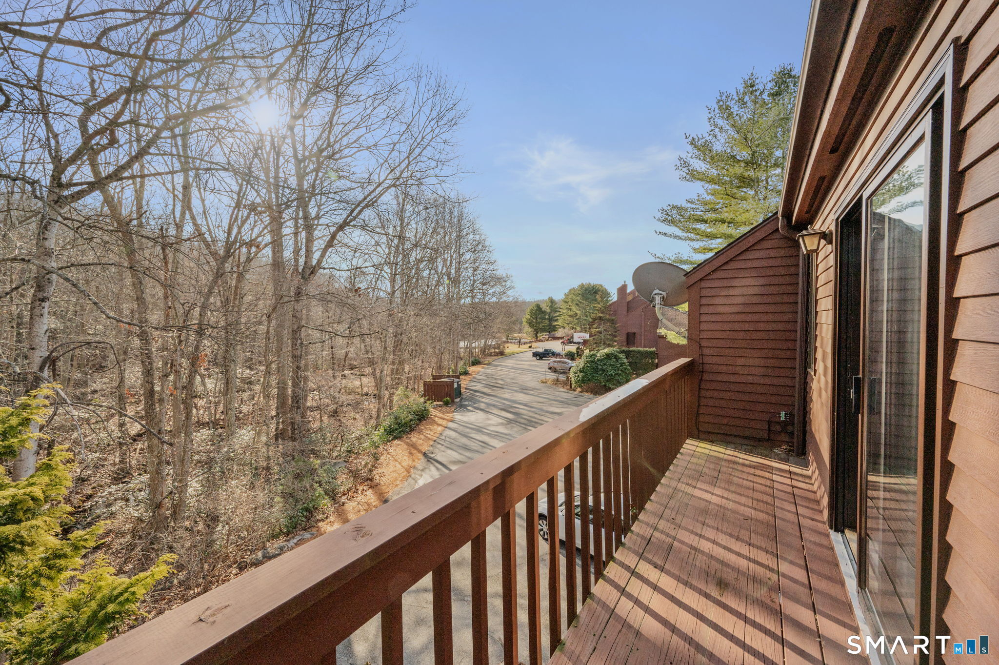 97 West Main Street, Unit 24 East Lyme, CT 06357 - Photo 24 of 39 a view of balcony and wooden floor