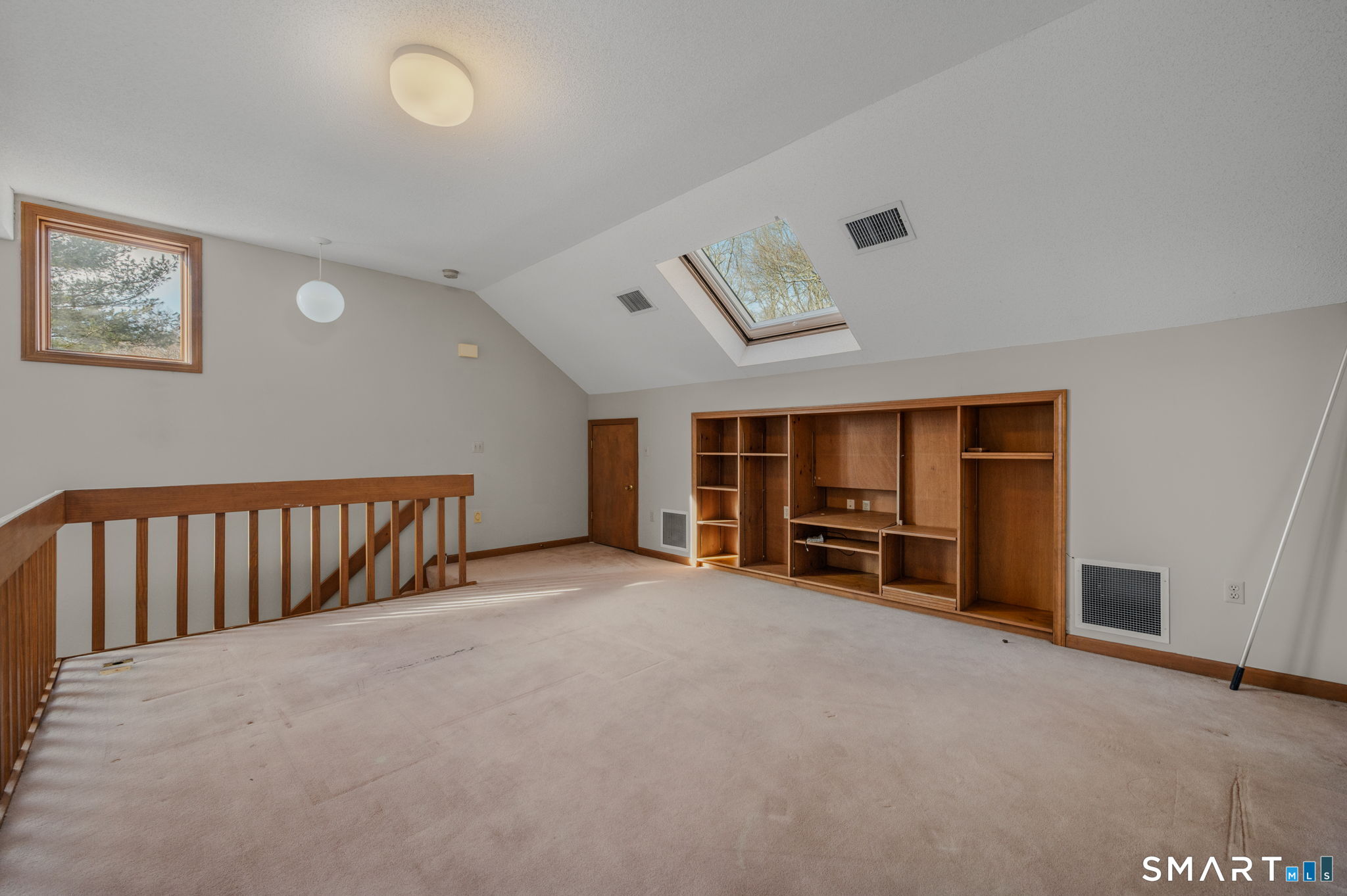 97 West Main Street, Unit 24 East Lyme, CT 06357 - Photo 29 of 39 a view of an empty room with furniture and a window