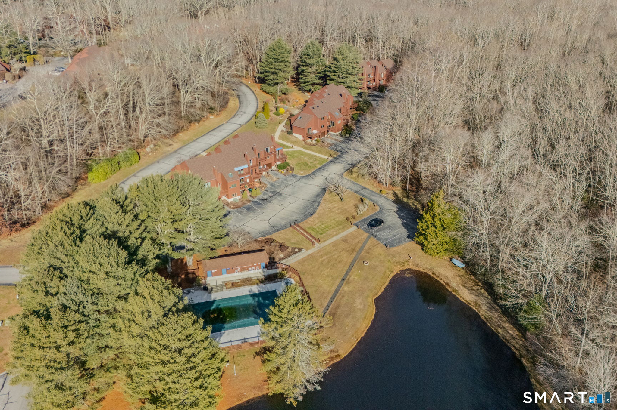 97 West Main Street, Unit 24 East Lyme, CT 06357 - Photo 34 of 39 a view of a yard with wooden fence