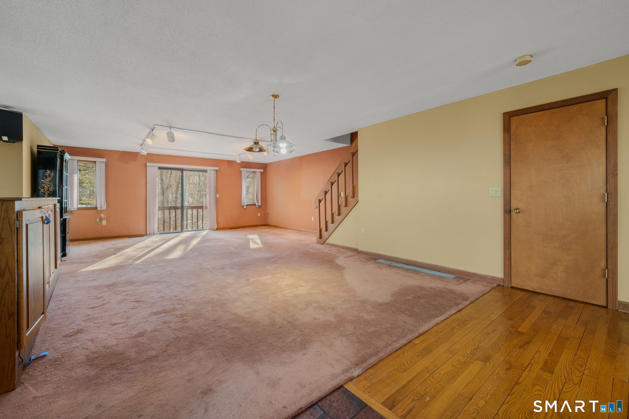 97 West Main Street, Unit 24 East Lyme, CT 06357 - Photo 10 of 39 a view of livingroom with an empty space