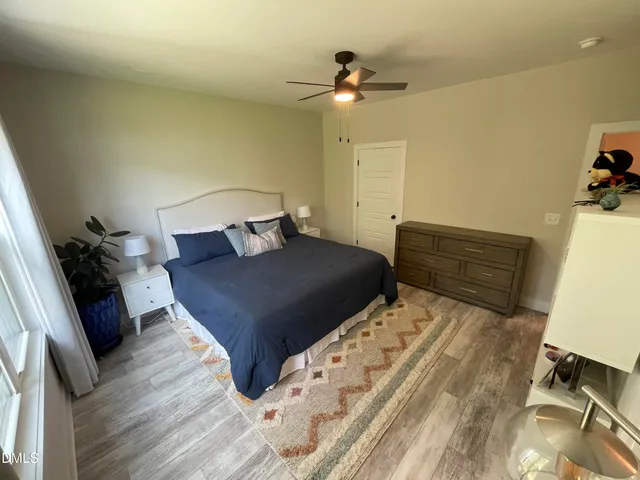 a view of entryway with wooden floor