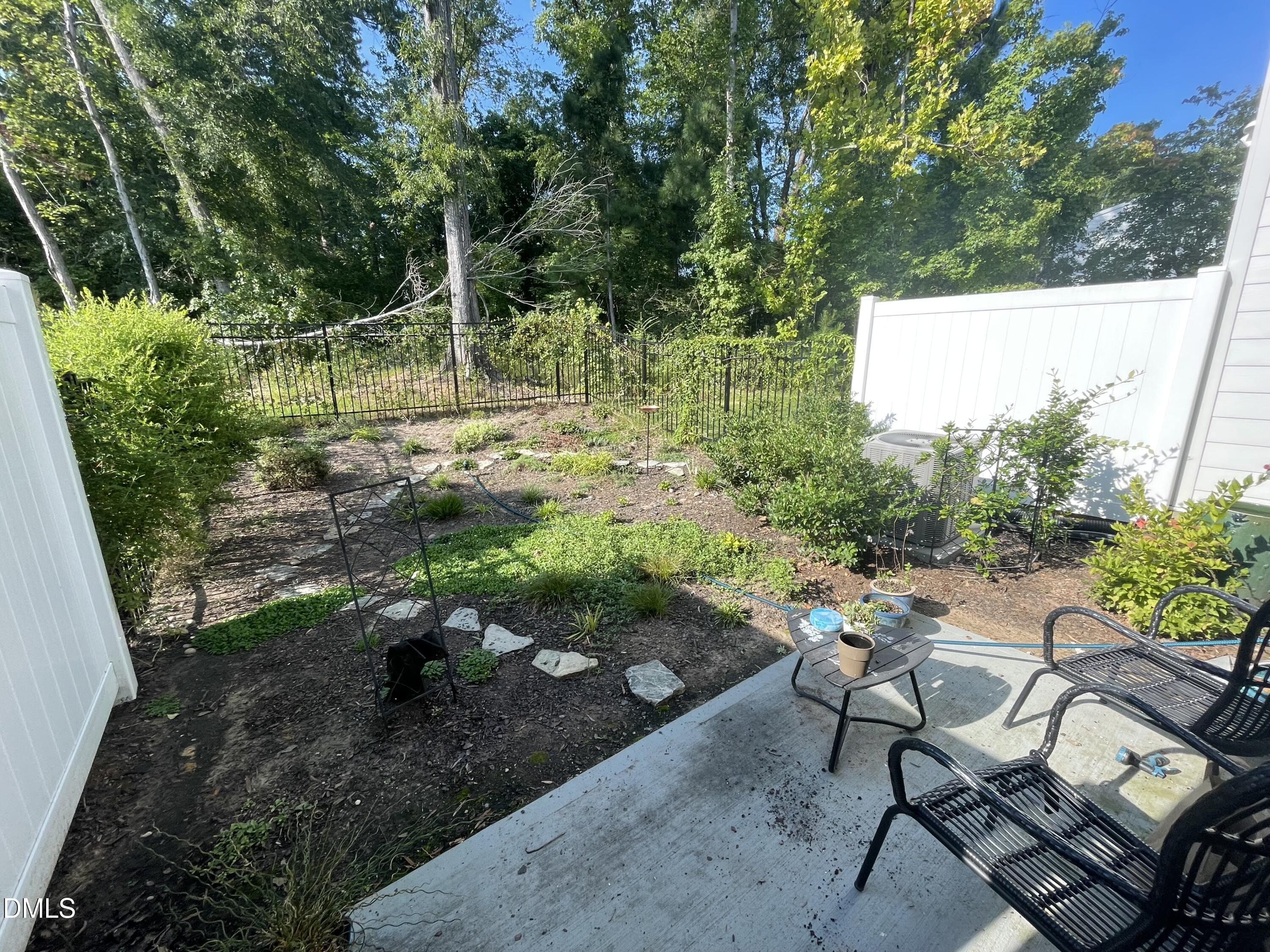 4108 Convergence Street Durham, NC 27704 - Photo 25 of 31 a view of a backyard with sitting area