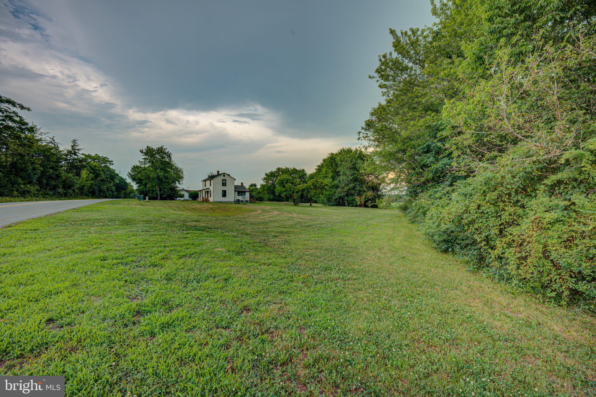 24177 Rapidan Road Mitchells, VA 22729 - Photo 34 of 43 Charming home amidst lush greenery.
