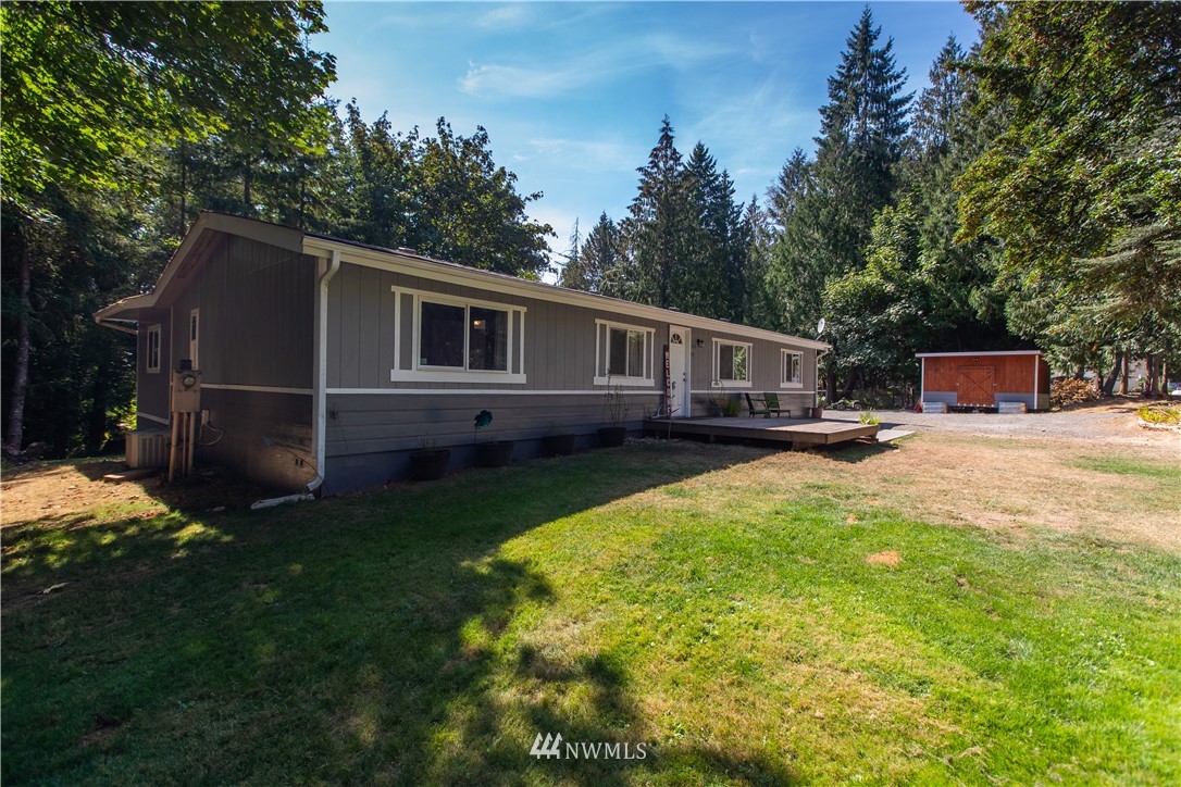 282 Woodard Road, Unit 79 Napavine, WA 98532 - Photo 2 of 29 a view of a house with a backyard