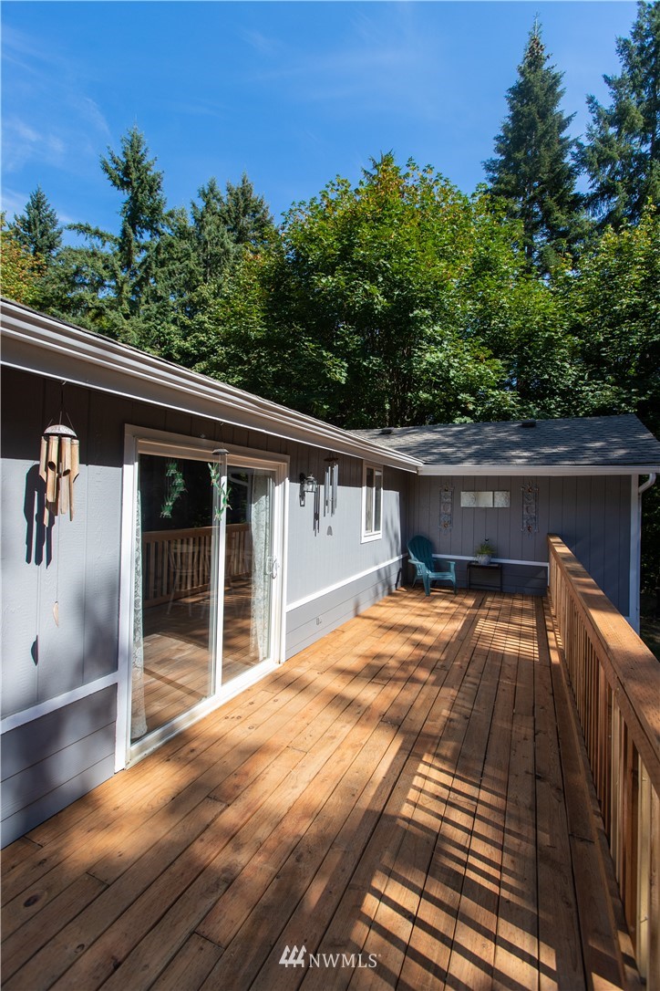 282 Woodard Road, Unit 79 Napavine, WA 98532 - Photo 6 of 29 a balcony with furniture and a garden