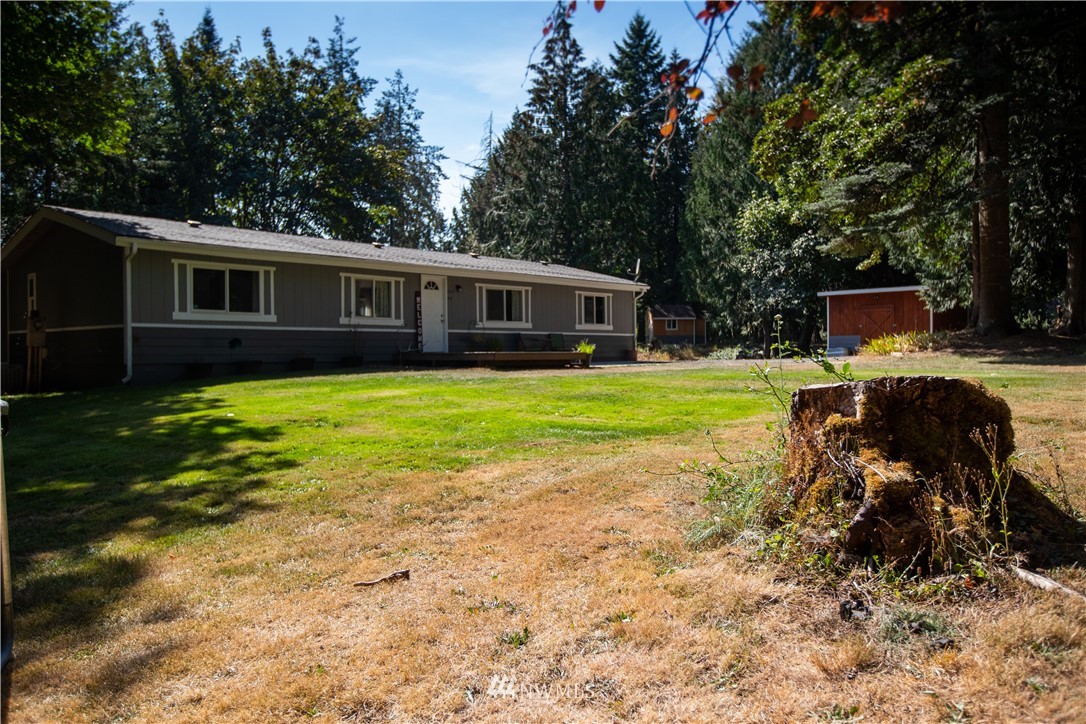 282 Woodard Road, Unit 79 Napavine, WA 98532 - Photo 10 of 29 a view of a house with a yard and sitting area