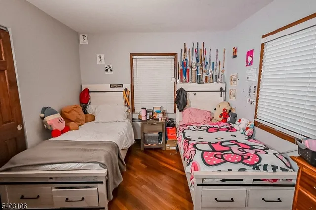 a bedroom with furniture and a bed