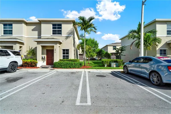 a car parked in front of a house