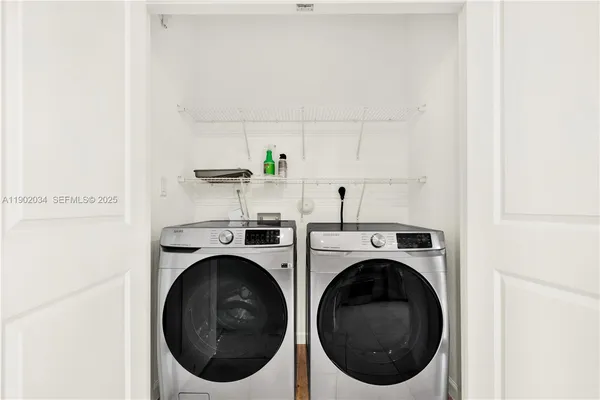 a utility room with dryer and washer