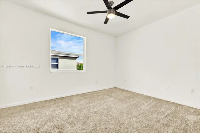 a view of a room with a fan