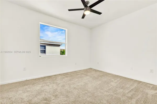 a view of a room with a fan