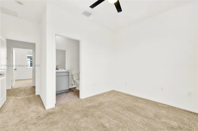 a bathroom with a sink a toilet and a bathtub