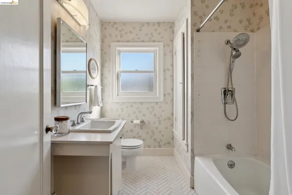 a bathroom with a sink and a toilet