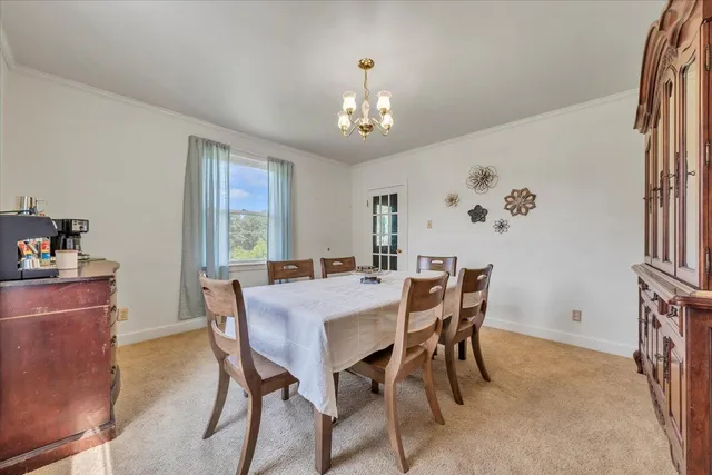 a kitchen with sink cabinets and wooden floor