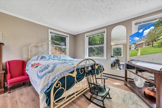 a living room with a couch and a window