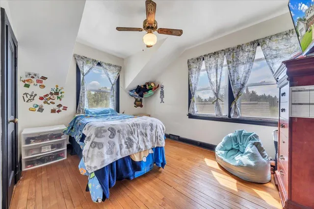 a bathroom with a sink toilet and mirror