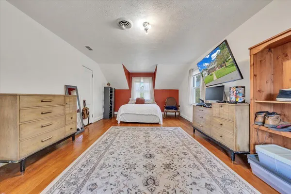 a view of front door with furniture and stairs