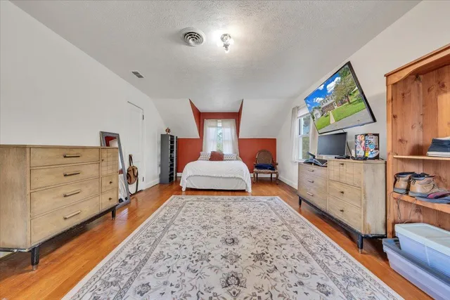 a view of front door with furniture and stairs