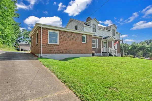 a front of a house with a yard