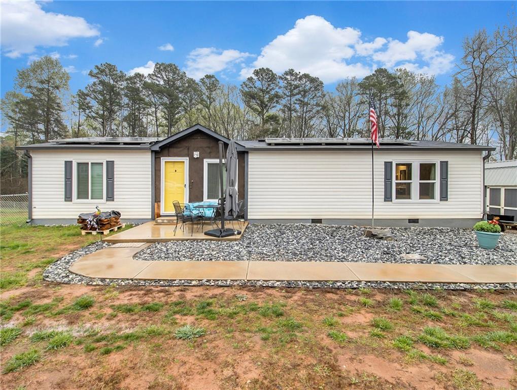 255 Southgate Road Alto, GA 30510 - Photo 1 of 1 a view of a house with a backyard and a tree