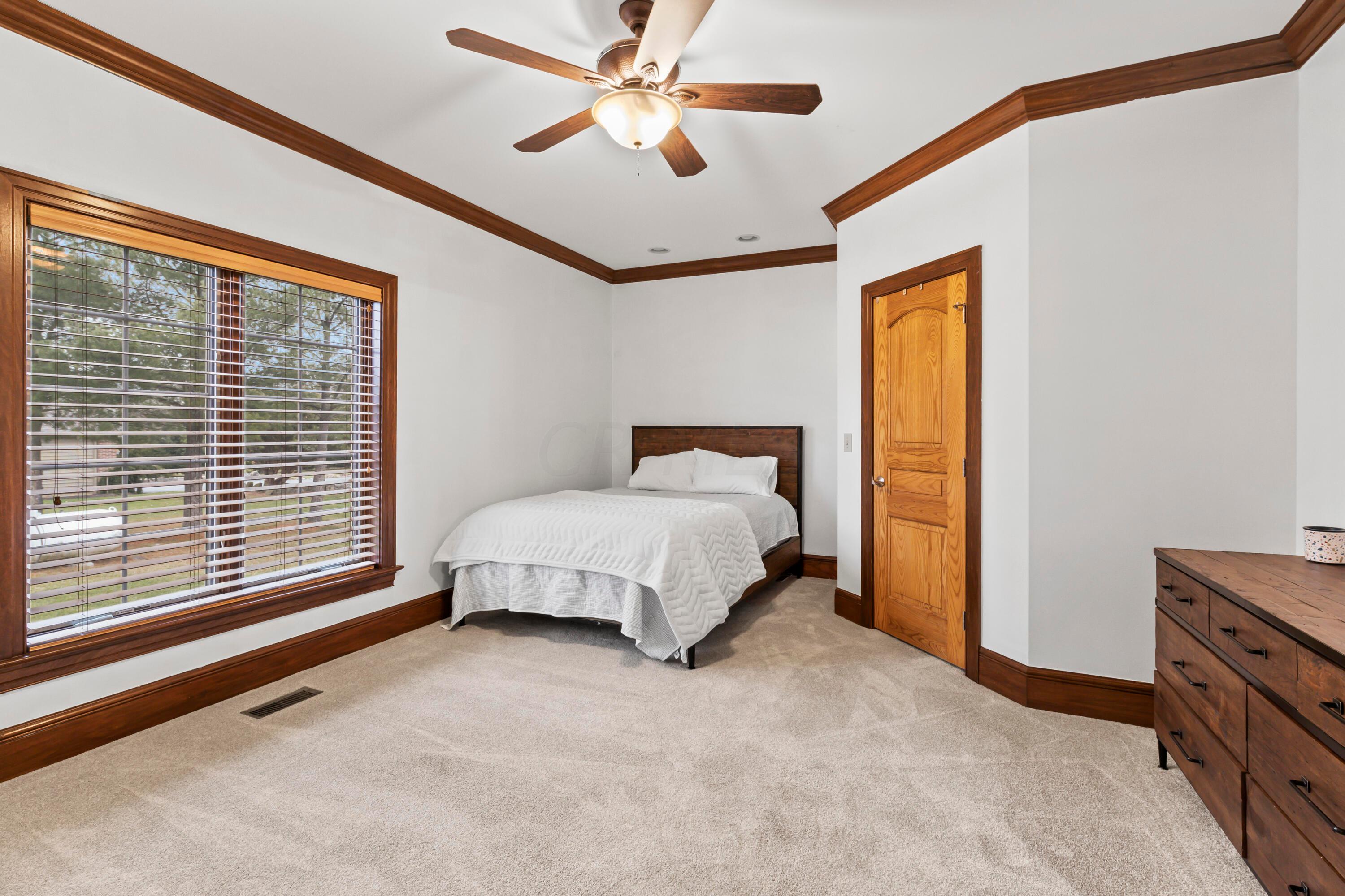 6043 Dublin Road Delaware, OH 43015 - Photo 14 of 98 • New greige carpet ~ 7/2023
• Ivory painted walls
• Crown molding
• Lighted ceiling fan
• Transom window
• Can lighting
• 2” blinds