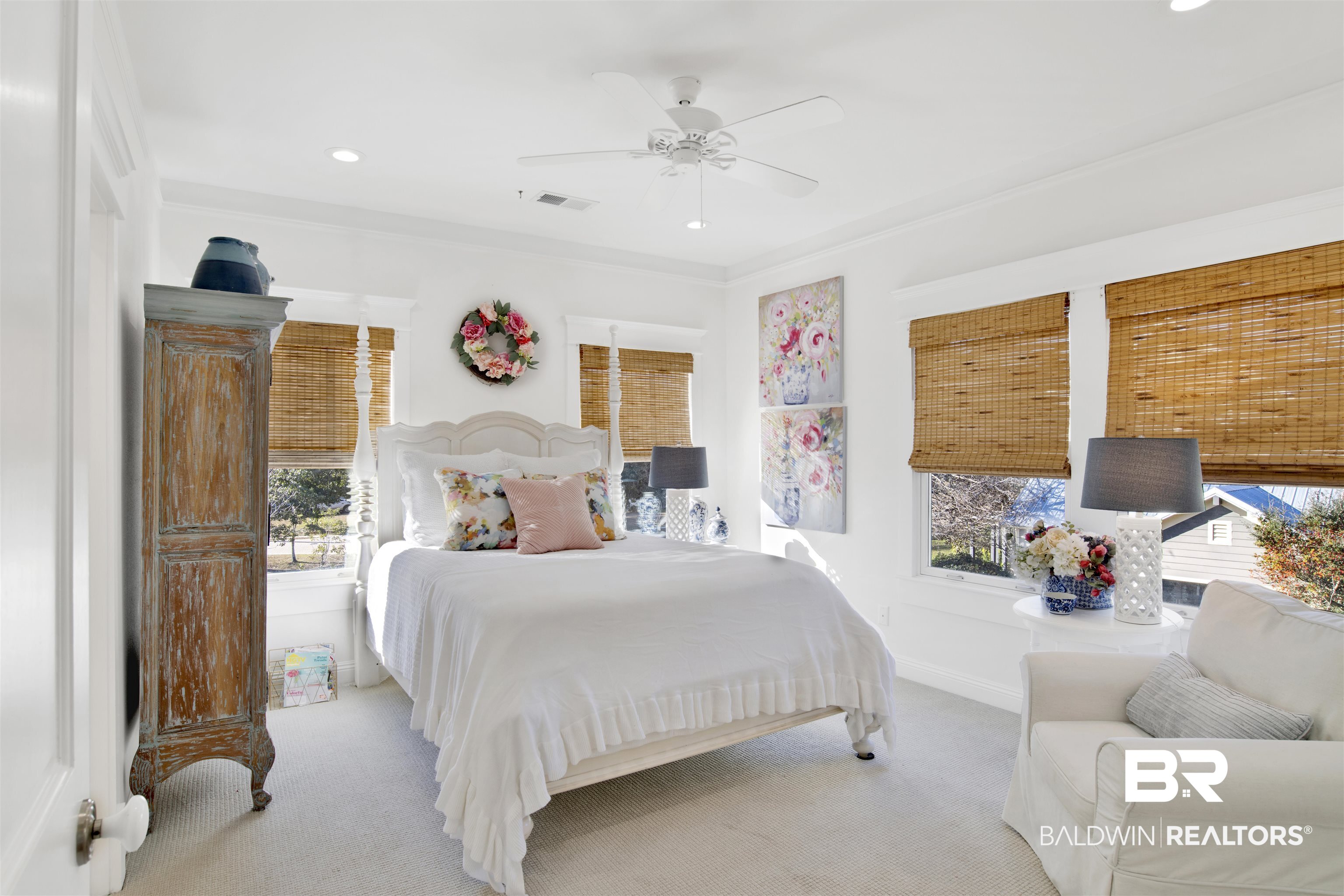 12094 Old Federal Road Magnolia Springs, AL 36555 - Photo 27 of 48 Bedroom featuring light carpet, ceiling fan, and ornamental molding