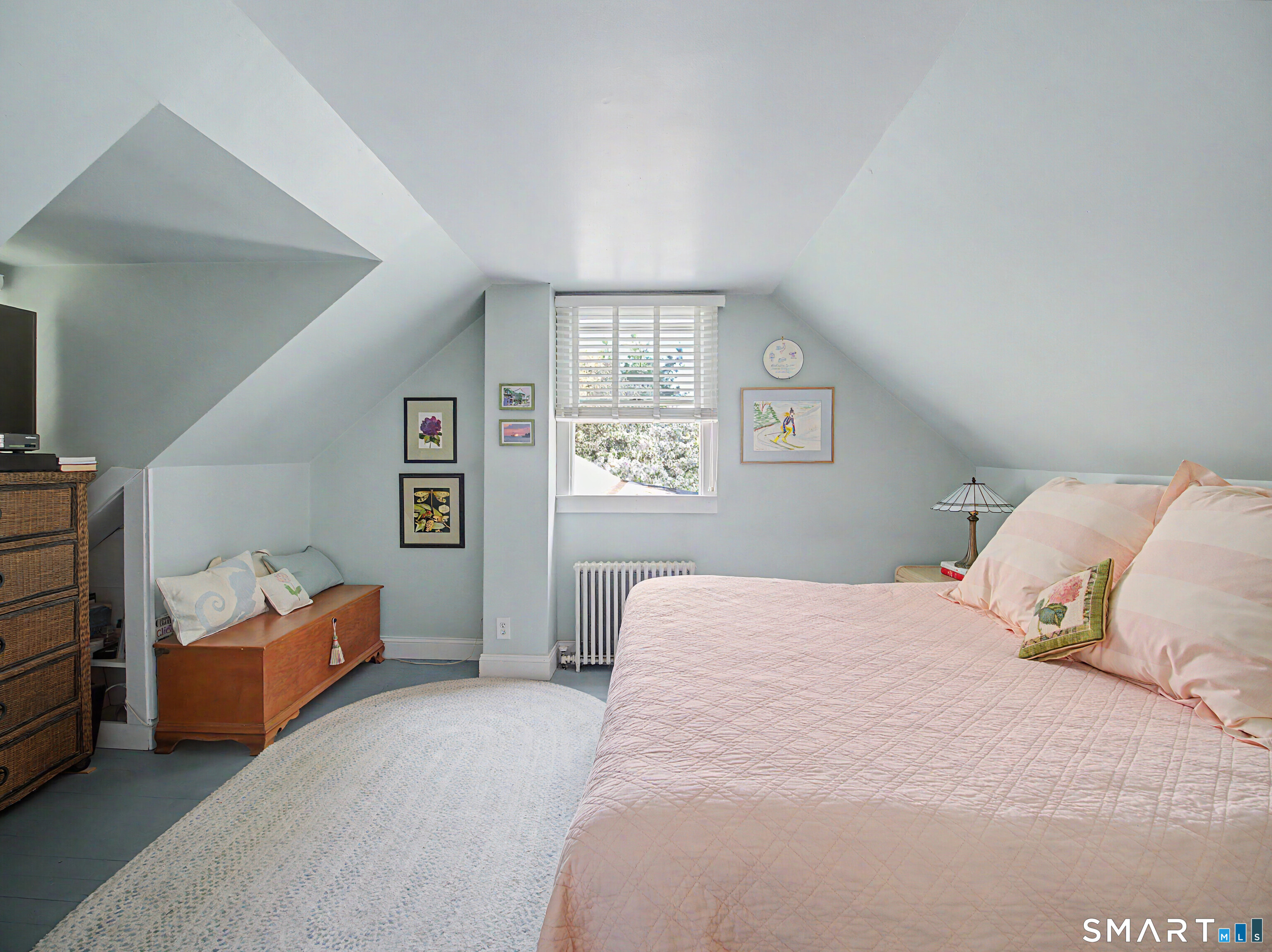 173 Puritan Road Fairfield, CT 06824 - Photo 12 of 19 a bedroom with bed and window