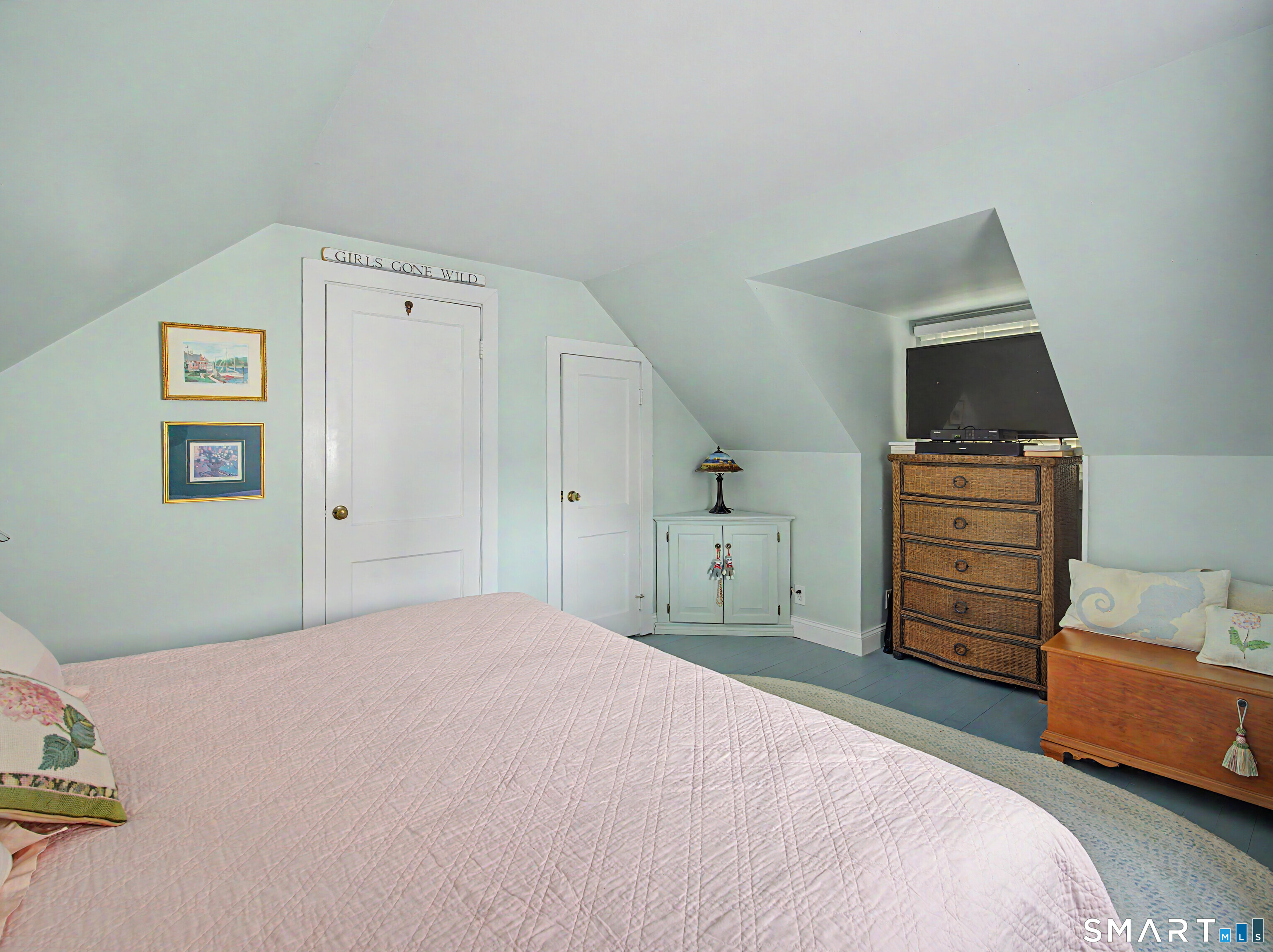 173 Puritan Road Fairfield, CT 06824 - Photo 13 of 19 a bedroom with a bed and furniture
