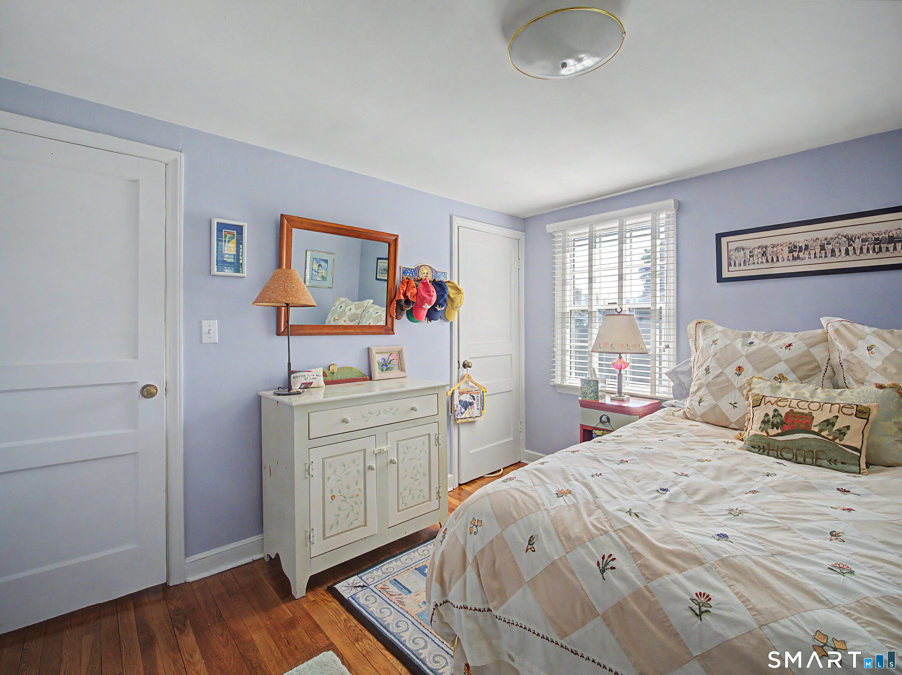 173 Puritan Road Fairfield, CT 06824 - Photo 15 of 19 a bedroom with a bed and a dresser