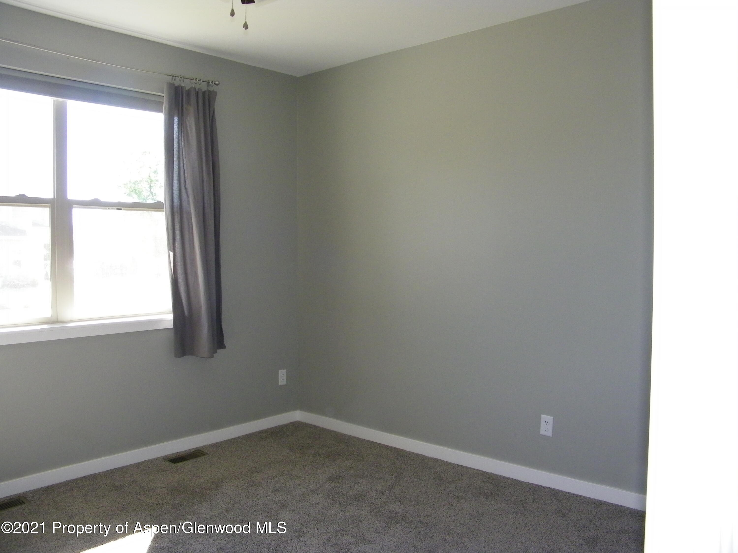 1717 Belgian Loop Silt, CO 81652 - Photo 11 of 16 an empty room with a window