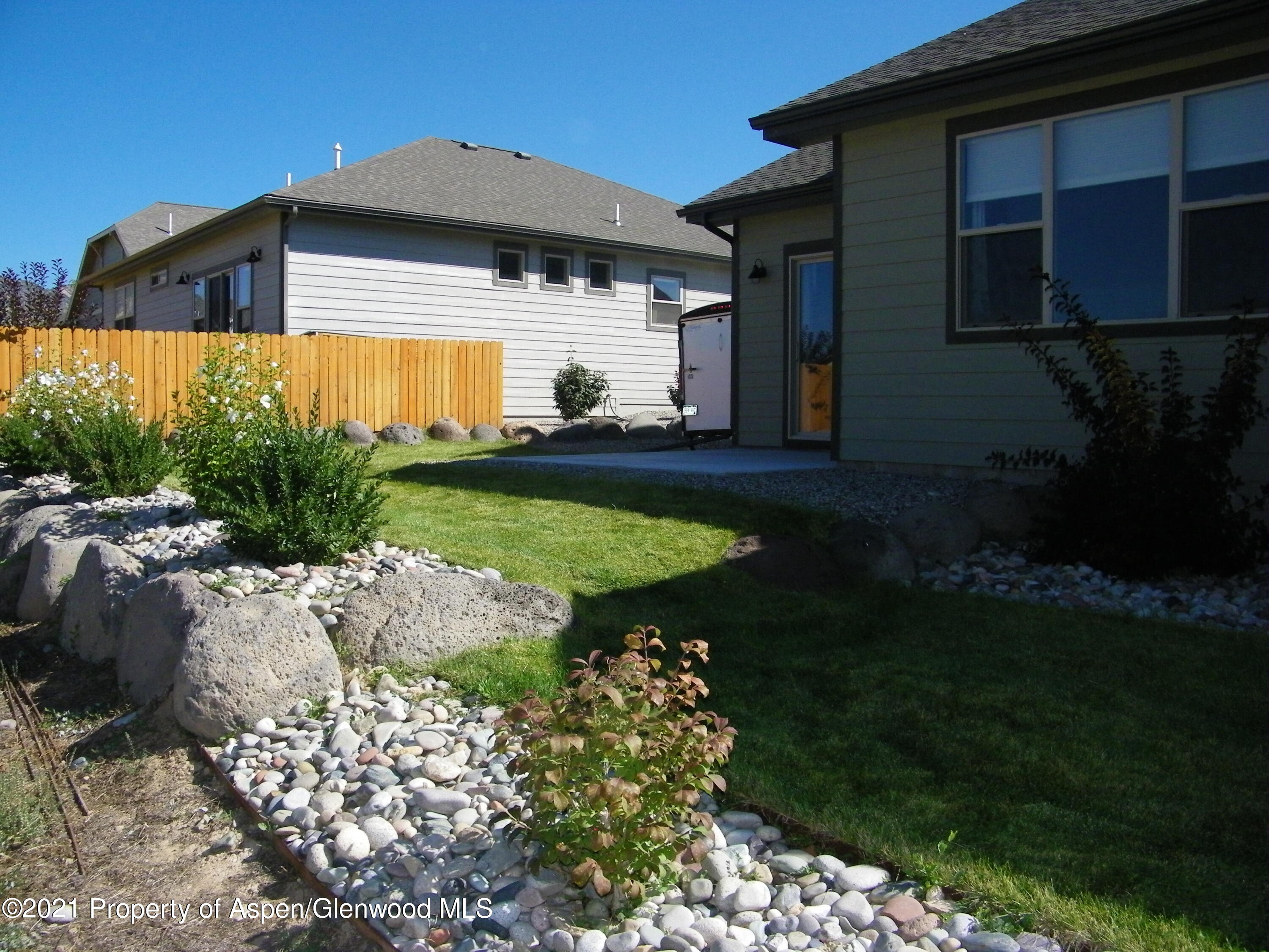 1717 Belgian Loop Silt, CO 81652 - Photo 16 of 16 a front view of a house with a garden