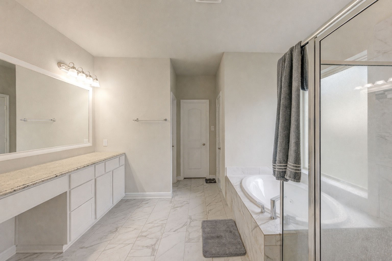 2910 Knotty Frst Drive Spring, TX 77373 - Photo 11 of 20 a bathroom with a sink and a mirror