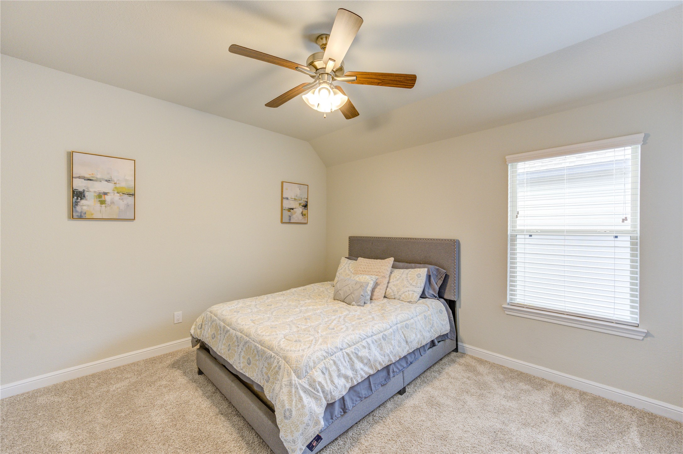 2910 Knotty Frst Drive Spring, TX 77373 - Photo 13 of 20 a bedroom with a large bed and a window
