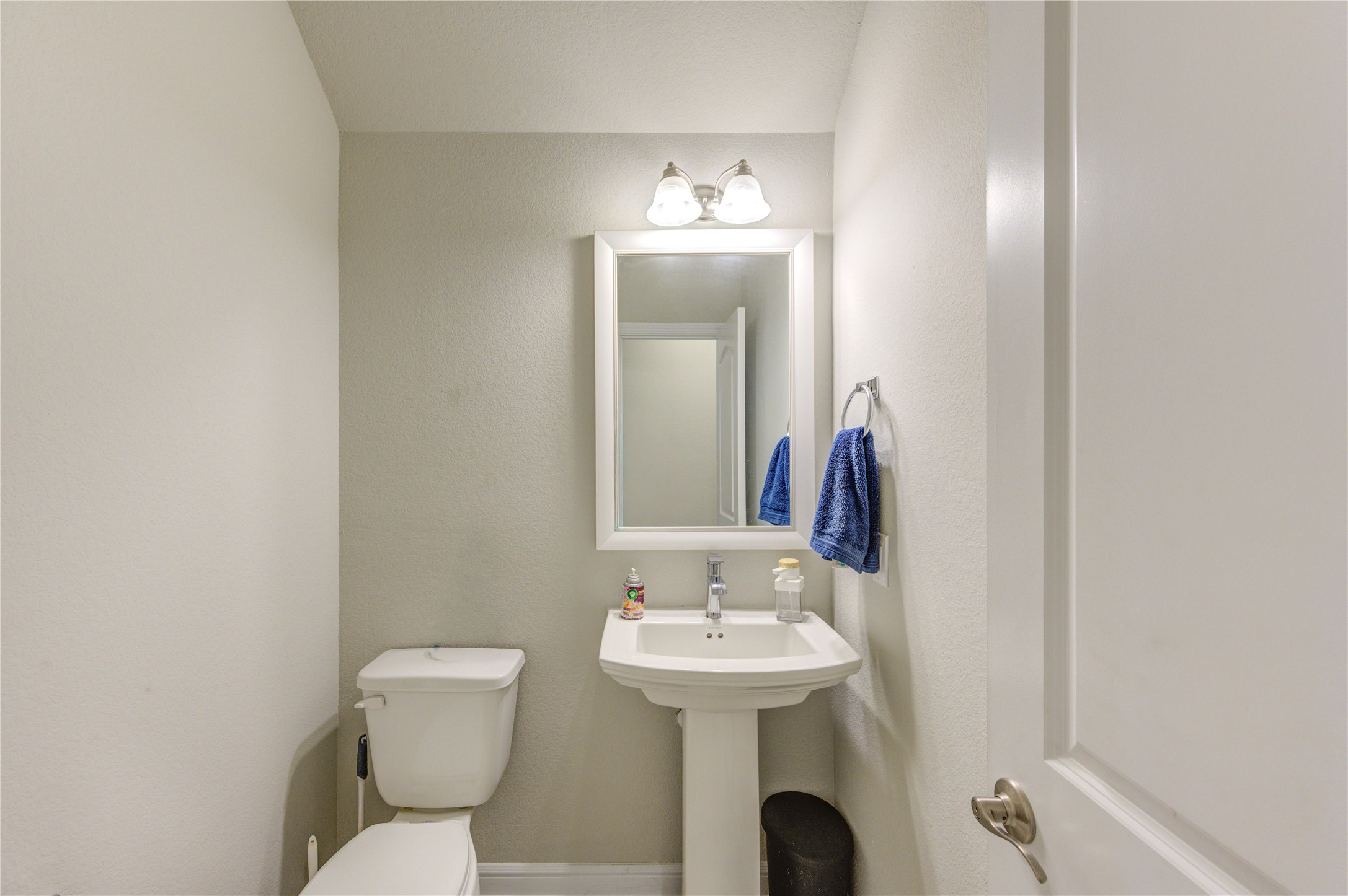 2910 Knotty Frst Drive Spring, TX 77373 - Photo 19 of 20 a bathroom with a toilet sink and mirror