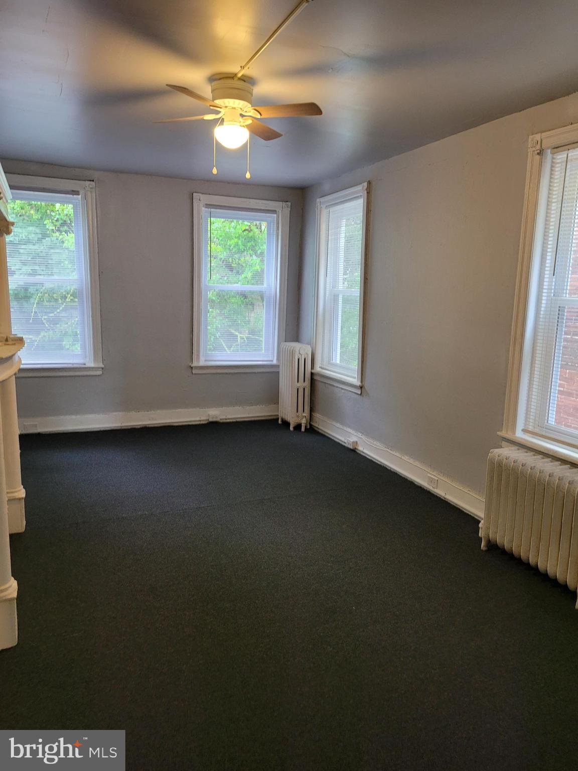 1422 Blavis Street Philadelphia, PA 19140 - Photo 11 of 20 an empty room with a window