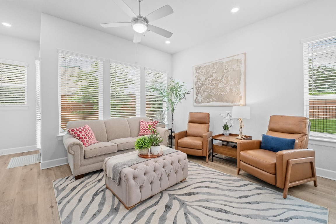 144 Monterey Oak Trail Georgetown, TX 78628 - Photo 4 of 28 a living room with furniture and a large window