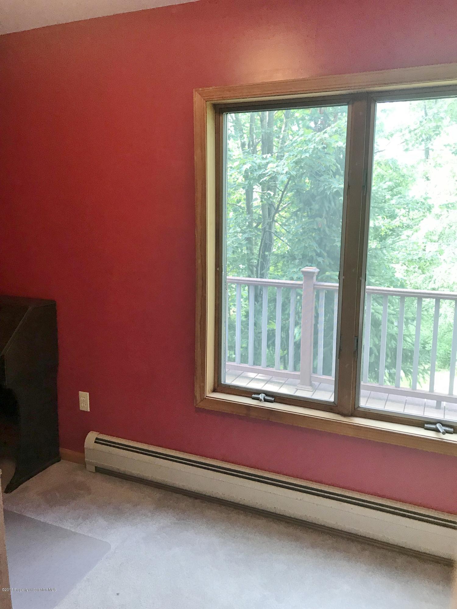 20 Ridgeview Drive Scranton, PA 18504 - Photo 15 of 39 a backyard of a house with a large window