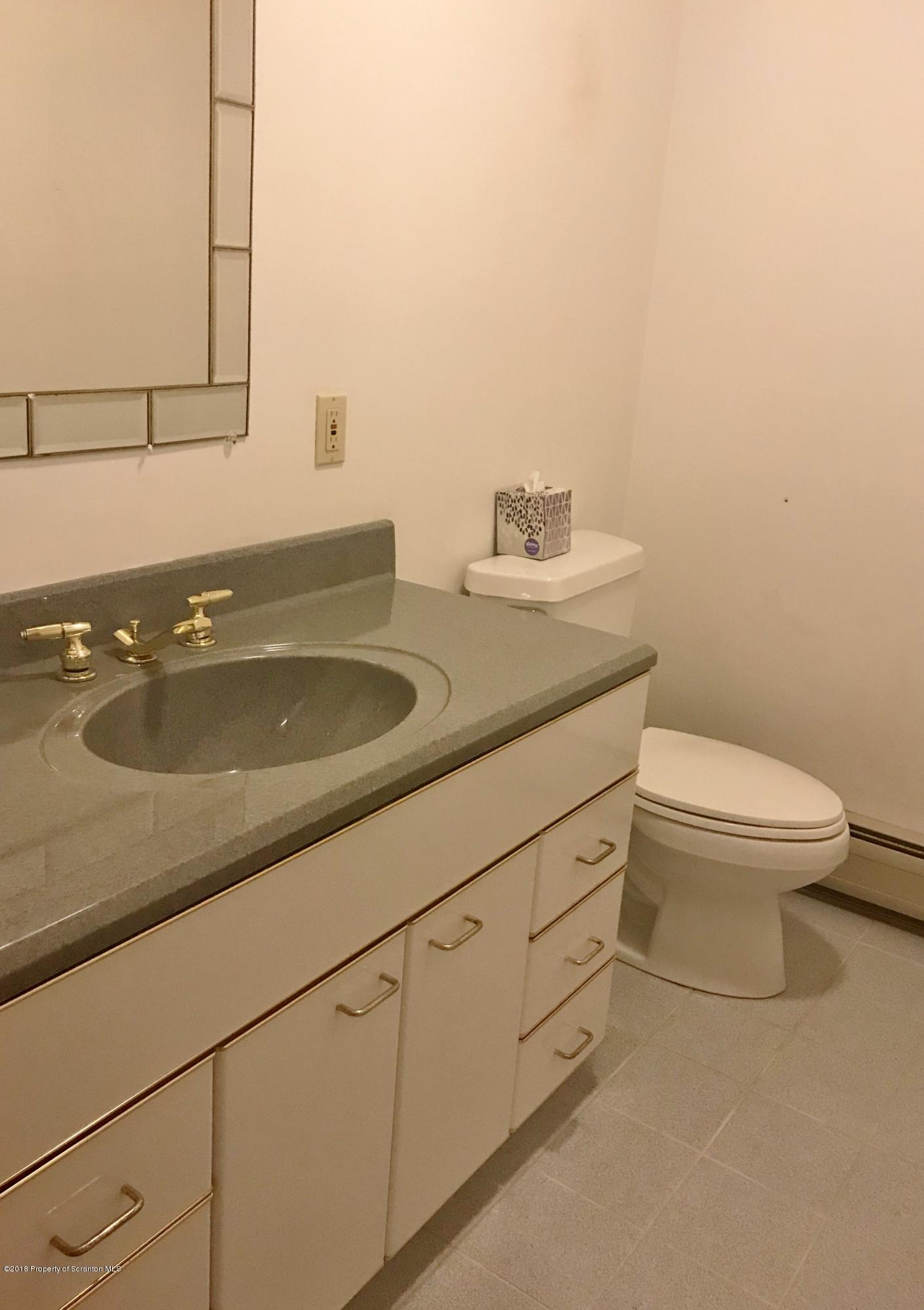 20 Ridgeview Drive Scranton, PA 18504 - Photo 17 of 39 a bathroom with a sink and a toilet