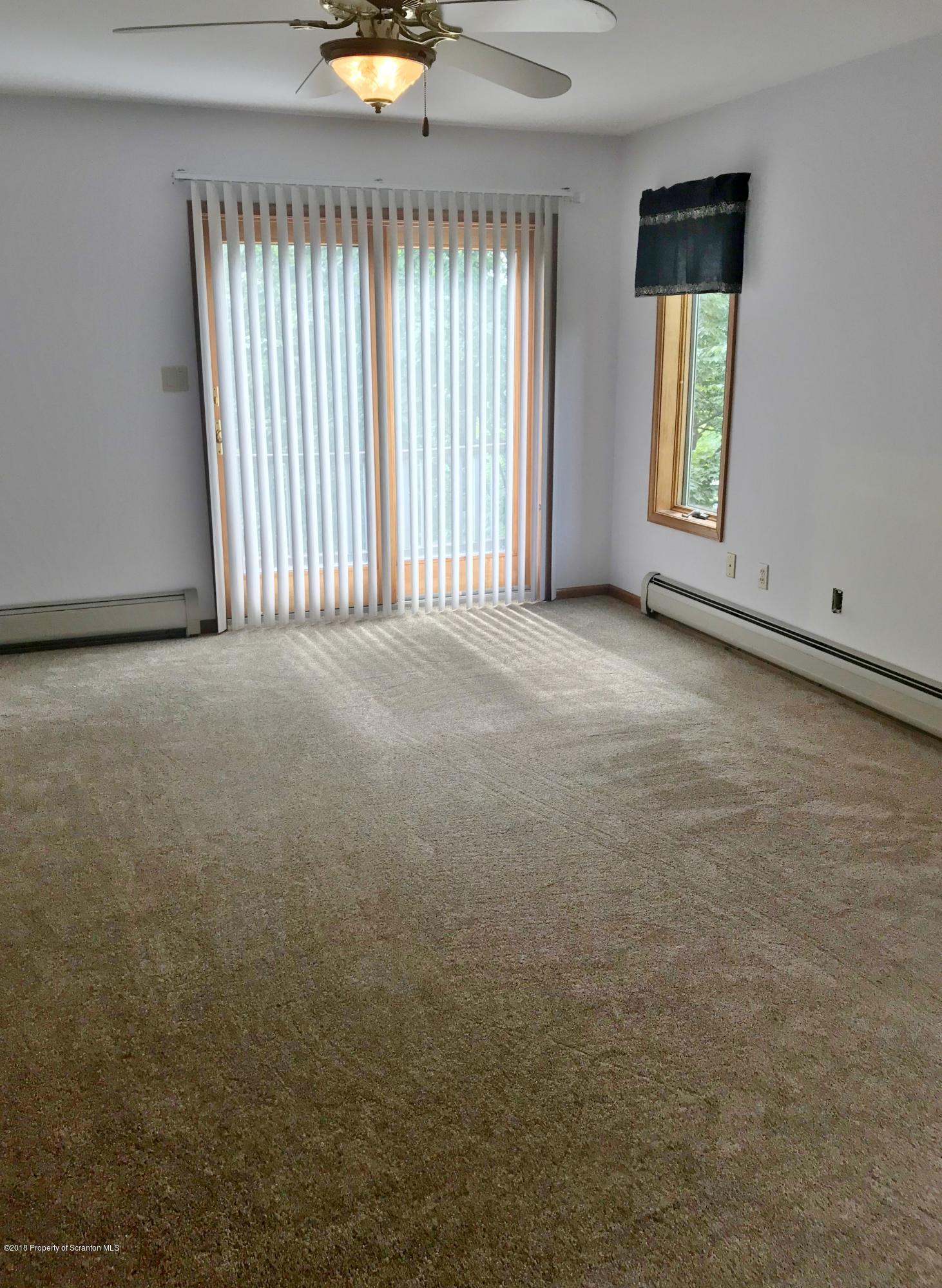 20 Ridgeview Drive Scranton, PA 18504 - Photo 21 of 39 an empty room with windows and mirror